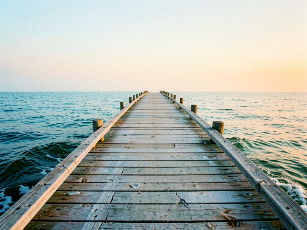 sun bleached coastal pier soft morning haze weathered wooden