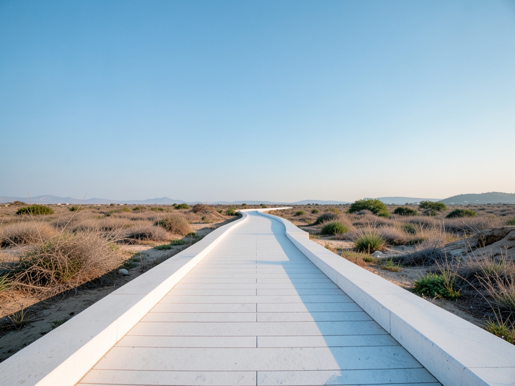 minimalist architectural landscape featuring long winding path made