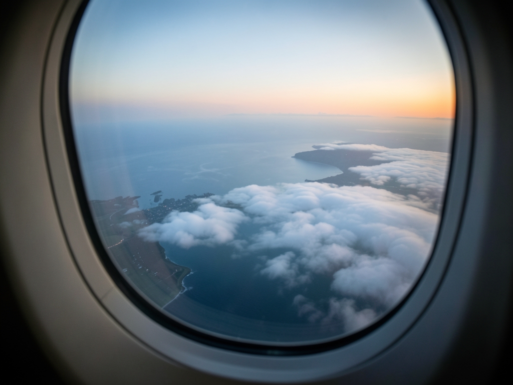 misty dawn over English Channel seen from high altitude