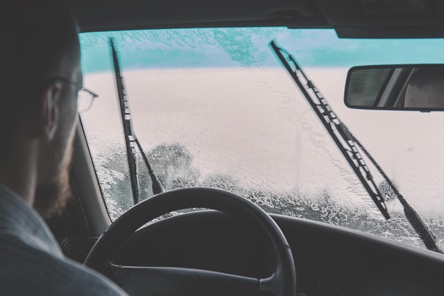 car car wallpapers windshield driving raining windshield wipers guy man people steering wheel gray rain