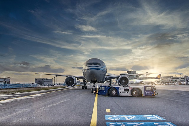 airplane runway airport tarmac aircraft vehicle nature truck airliner clouds asphalt jet flight transportation system air trav