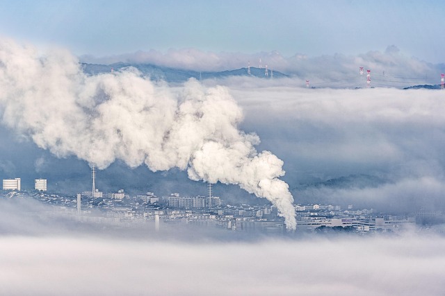climate change issue incineration of domestic waste smoke city life carbon dioxide air pollution fog transmission tower japan smoke