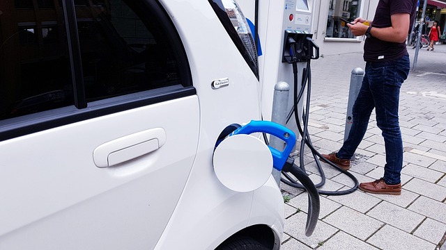 electric car charging station electric cable charge terminal man pay automatic electric car electric car electric car electric ca