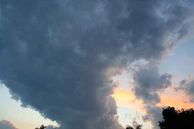 cloud nature funnel shaped tall dark sunset sky