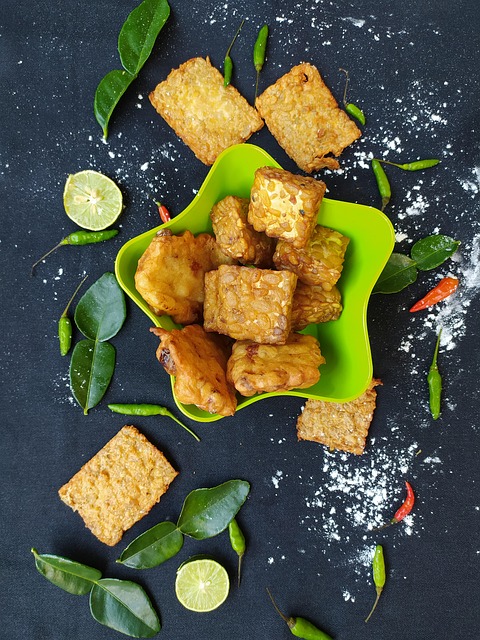 tempeh food dish tempe snack tasty delicious healthy nutrition cooked traditional messy table tropical food indonesian tempeh