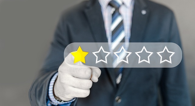 criticism write a review review star hand finger turn on switch off company entrepreneur person man necktie criticism criticis