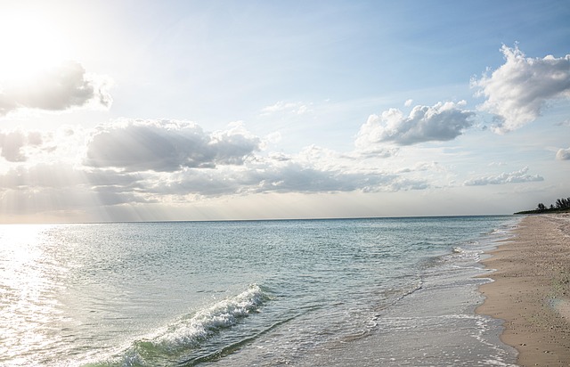 beach tropical waves sand nature clouds sky seascape ocean
