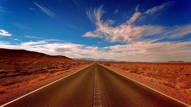 landscape highlands desert blue heaven clouds road just horizon vanishing point endless nature path