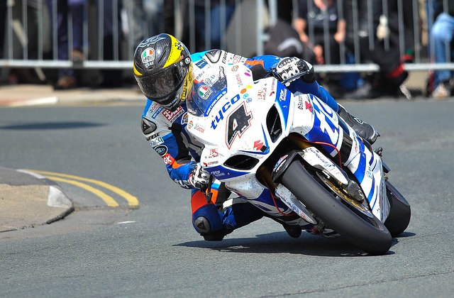 motorbike racing motorcycle race bike speed road drive sport biker curve motorcyclist extreme helmet racer riding motorbike
