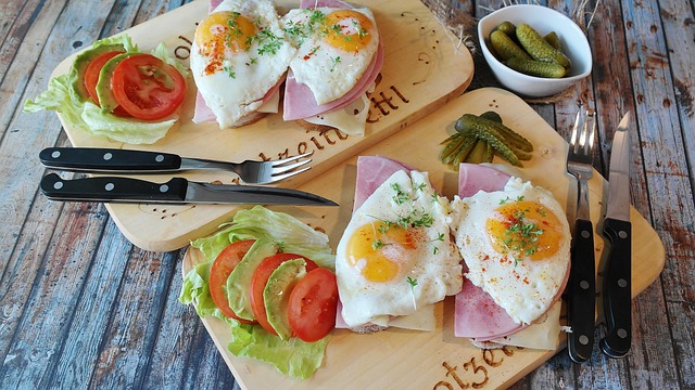 loaf ham tighter max egg fried egg egg yolk eggs food meal fried eggs protein enjoy the meal fried yummy pickle tomato black