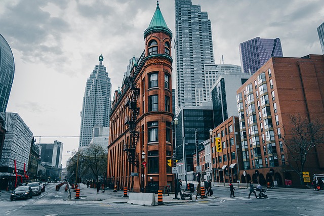 architecture urban street building photography winter nature cloudy toronto canada city road cars people sky classic season