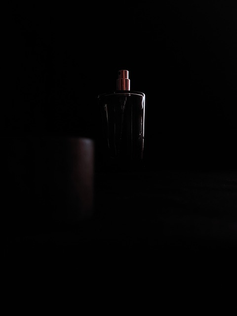cologne bottle wood dark black perfume cap packaging endorsement