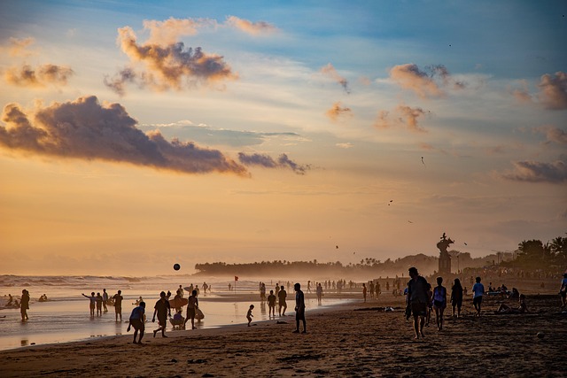 beach dusk people vacation leisure swim ocean sea water sand shore nature seashore coast tropical canggu bali indonesia