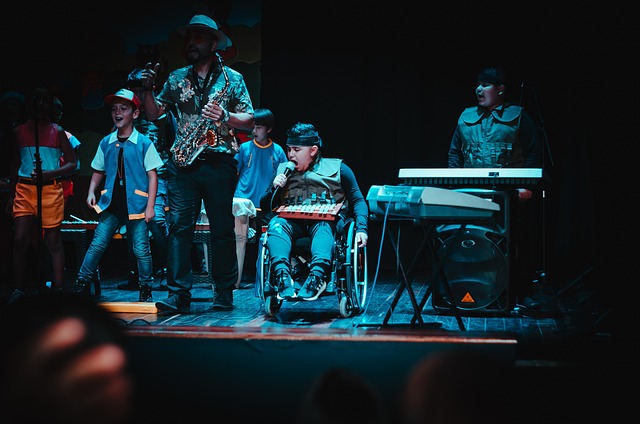 music band child wheelchair saxophone singer dance entertainment performance festival sound stage show club musical instrumen