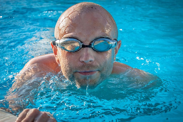 man swimmer nature pool swimming pool water swim sports goggles male guy