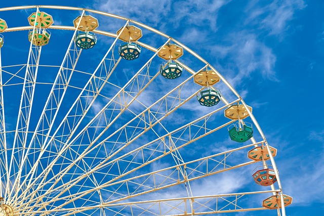 ferris wheel fair amusement ride entertainment fun trip amusement park festival childhood fixed clouds heaven nature gondola s