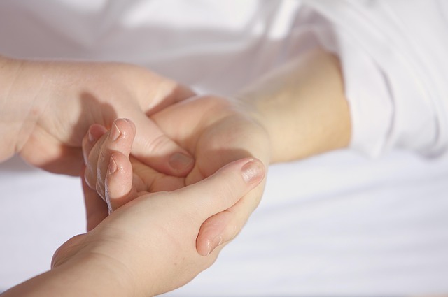 hands massage treatment fingers palm hand massage massaging hand wrist masseuse physiotherapy therapy relax relaxation recover