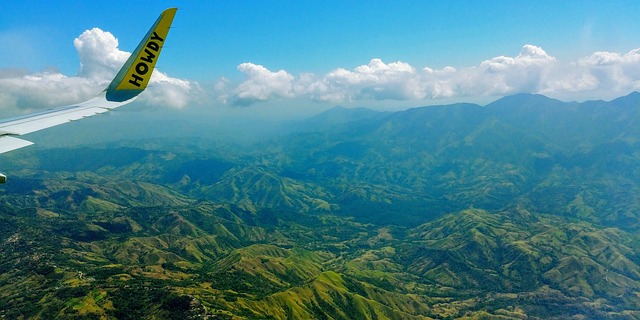 costa rica plane flying howdy spirit mountains hill landscape outlook jungle clouds heaven distance nature high freedom