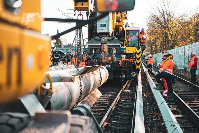 crane construction site construction worker track rails work track construction construction company construction site construction