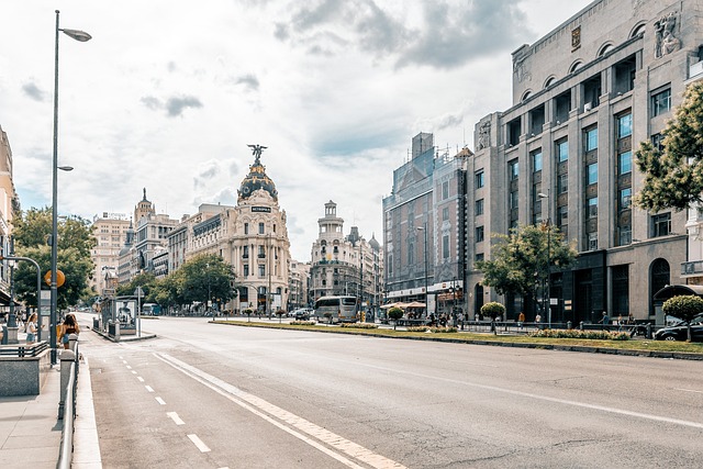 madrid nature city road sky clouds building urban capital street cars