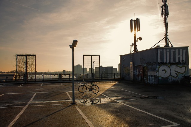 multi storey car park bicycle the shade evening sun shadows light wheel shadow play sun roof sunlight bright clouds heaven lad