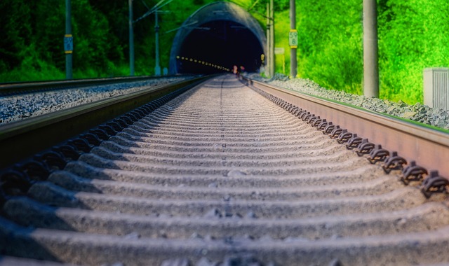 track rails tunnel route ice rail railroad tracks traffic transport railroad track gravel track bed perspective danger thresho
