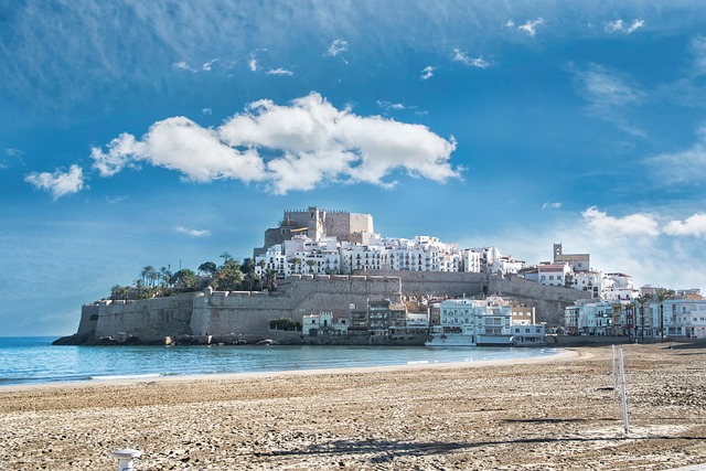 castle beach sea coast people clouds nature peniscola spain holiday landscape