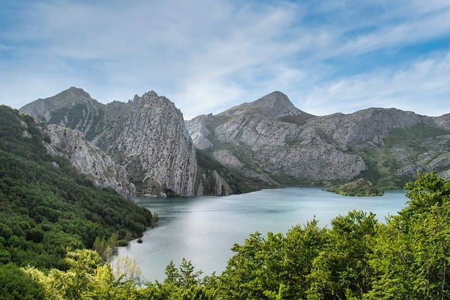 lake mountains nature sky clouds vegetation hiking europe spain summer day outdoors hiking trail river park rock beauty tra
