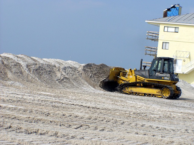 pensacola beach florida bulldozer beach sand sky clouds hurricane cleanup nature outside sea ocean
