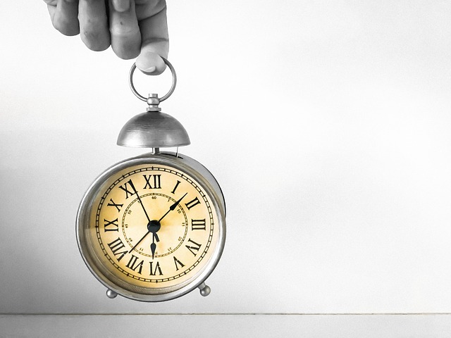 accuracy body part clock clock face finger hand holding human body part human hand indoors instrument of time minute hand number