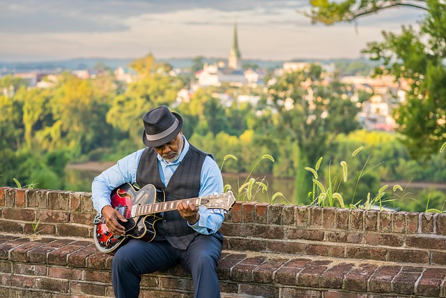 man music guitar senior countryside portrait