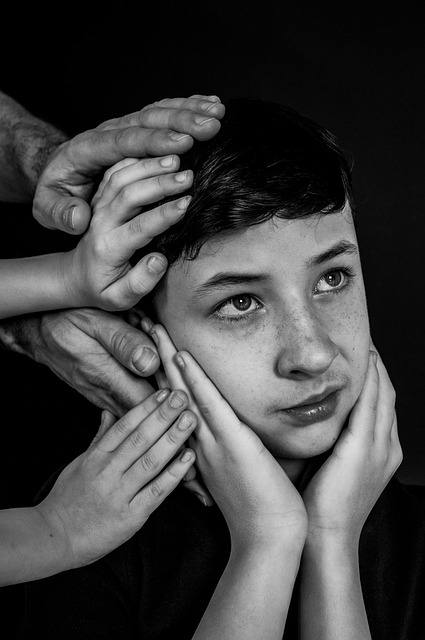 teen hands human sight family native care lend a hand teenage years protection help monochrome black and white portrait close
