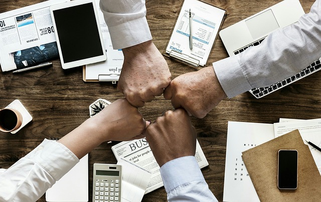 teamwork cooperation brainstorming business finance office team partners flat lay meeting collaboration corporation management