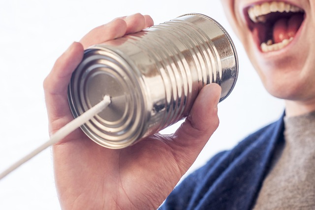 tin can speak talk microphone can tin mouth say communicate string yell hand teeth man guy speak speak speak talk talk t
