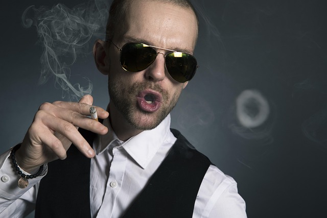 man smoking smoke cigarette face person tobacco smoker unhealthy model round style lifestyle sunglasses arrogance arrogant i