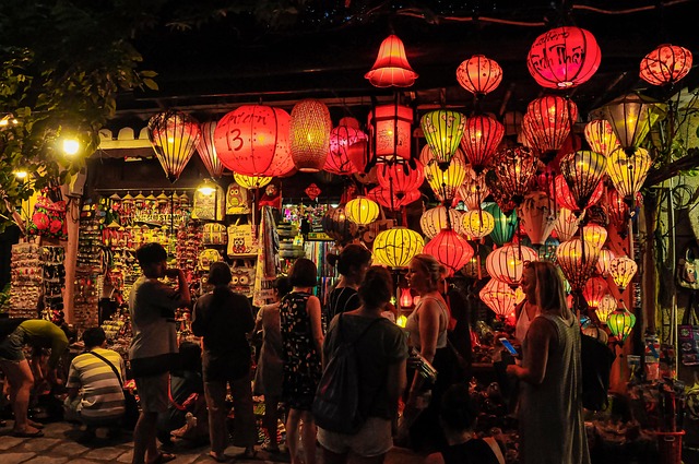 hoi an vietnam lanterns store shop tourists people culture traditional famous mid autumn lights night old town lunar new year